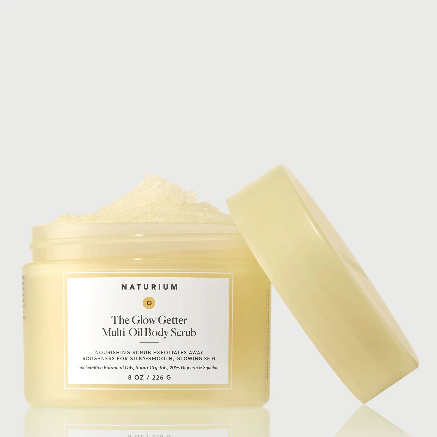 the-glow-getter-multi-oil-body-scrub-n4 NATR-40028-GlowGetter-Multi-Oil-Body-Scrub-Front-CapOff-bonebkgd.webp