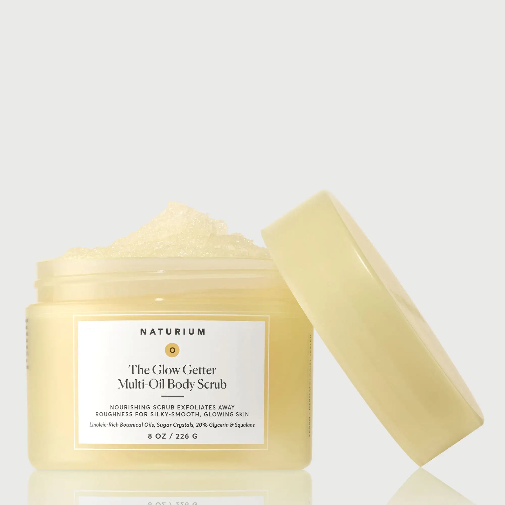 the-glow-getter-multi-oil-body-scrub-n4 NATR-40028-GlowGetter-Multi-Oil-Body-Scrub-Front-CapOff-bonebkgd.webp